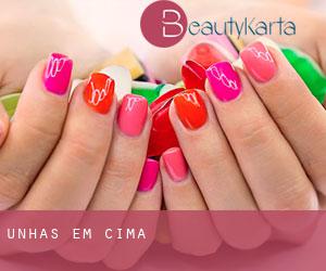 Unhas em Cima